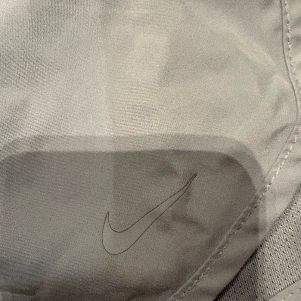 Never worn nike shorts is soft grey